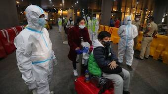 Eleven UK arrivals in Delhi found COVID-19 positive, health secy reviews status; Karnataka announces night curfew