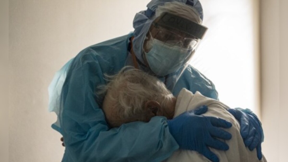 Hospital staff 'truly exhausted,' says Texas doctor on viral photo of him hugging elderly COVID-19 patient