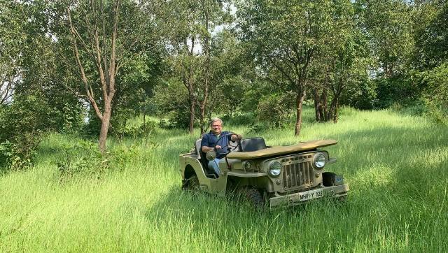 Adil in a Mahindra jeep