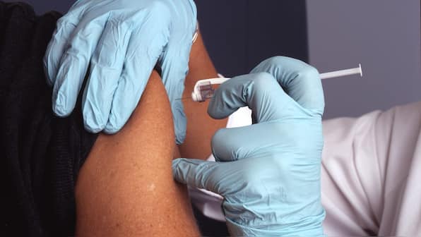Johnson and Johnson expects COVID-19 vaccine results soon but lags behind in production