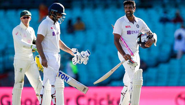 Not out batsman India’s Ravichandran Ashwin, right, and Hanuma Vihari walk from the field following play on the final day of the third cricket test between India and Australia at the Sydney Cricket Ground, Sydney, Australia, Monday, Jan. 11, 2021. The test ended in a draw and the series is at 1-1 all with one test to play. (AP Photo/Rick Rycroft)
