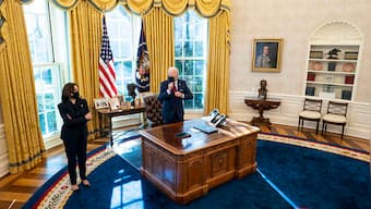 Week after taking office, Joe Biden moves to expand health coverage in pandemic economy