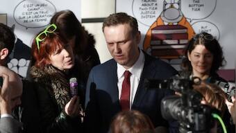'I am not afraid': Kremlin critic Alexei Navalny detained on arrival at Moscow airport
