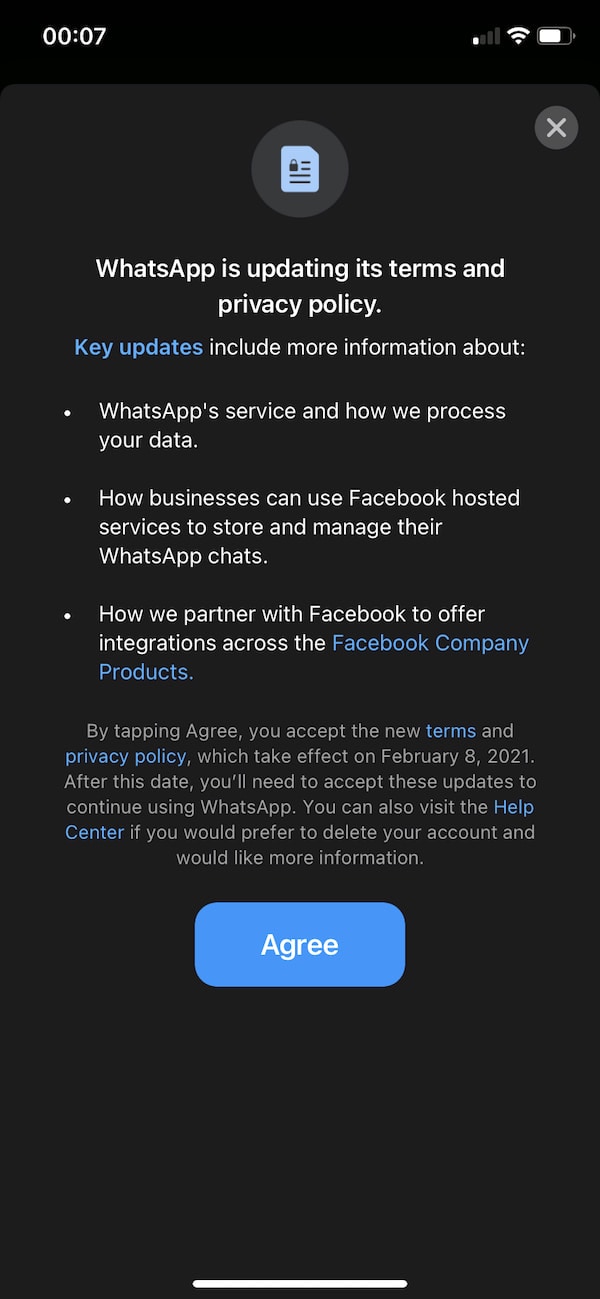 Screenshot of the WhatsApp privacy update in-app notification. 
