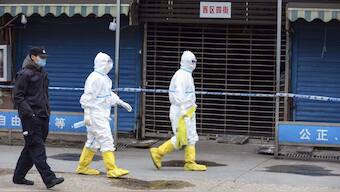 What are WHO researchers trying to learn about COVID-19 origins in Wuhan? Is the secrecy necessary?