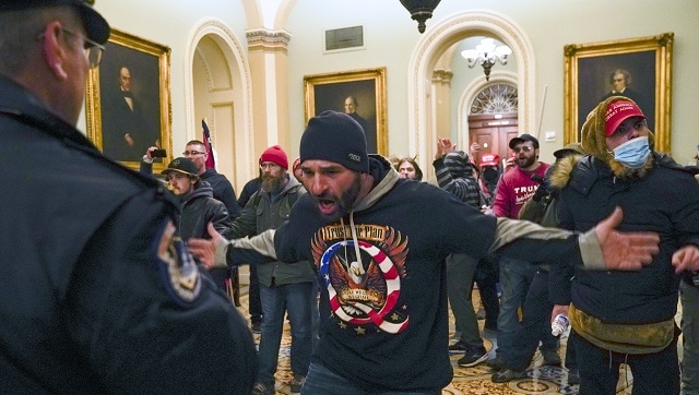 The pro-Trump mob took over the presiding officer’s chair in the Senate, the offices of the House speaker, and the Senate dais, where one yelled, “Trump won that election.” They mocked its leaders, posing for photos in the office of House Speaker Nancy Pelosi, one with his feet propped on her desk. Image courtesy: AP The pro-Trump mob took over the presiding officer’s chair in the Senate, the offices of the House speaker, and the Senate dais, where one yelled, “Trump won that election.” They mocked its leaders, posing for photos in the office of House Speaker Nancy Pelosi, one with his feet propped on her desk. Image courtesy: AP