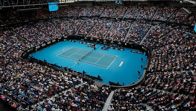 Australian Open brings cheer to Melbourne, but lingering fear of coronavirus remains