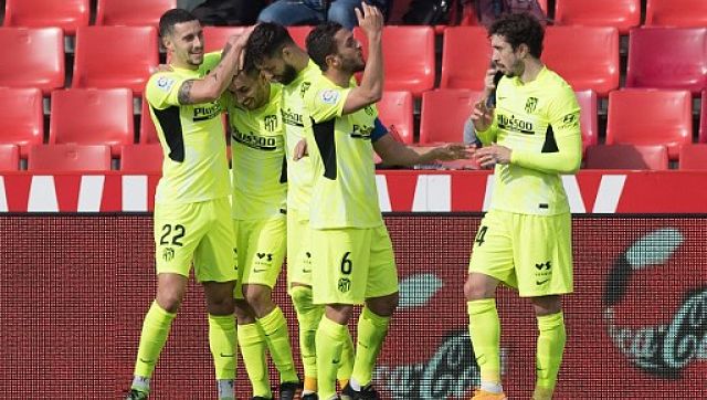 LaLiga: Atletico Madrid race to eight-point lead atop league with narrow Granada victory LaLiga: Atletico Madrid race to eight-point lead atop league with narrow Granada victory