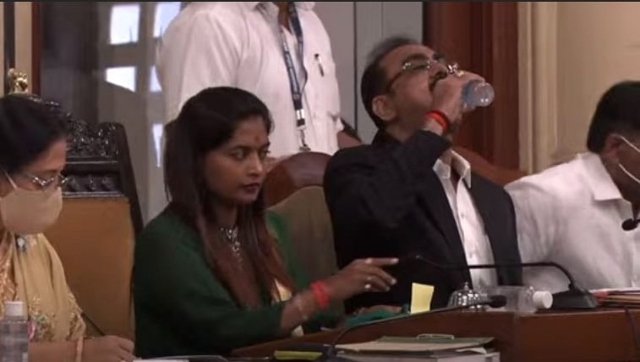 Watch: BMC top official drinks sanitiser instead of water by mistake, video goes viral Watch: BMC top official drinks sanitiser instead of water by mistake, video goes viral