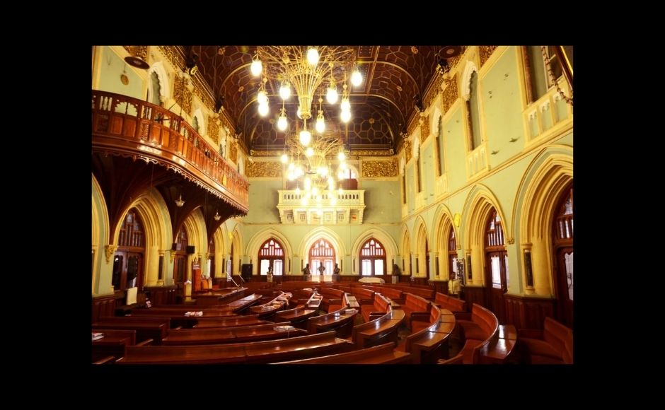 The Corporation Hall (shown in the picture above) is a place where history meets civics. Initially, meant for 80 councillors, the hall now seats 227. It was inspired by the Corporation Halls of Glasgow and Birmingham. It was destroyed by a fire in 2001 and was then restored by conservation architect Vikas Dilawari. The hall, with the ornate gilding on the ceiling, displays the ‘athra pagad jati’, the eighteen turbaned communities of the city. Photograph courtesy of the BMC. The Corporation Hall (shown in the picture above) is a place where history meets civics. Initially, meant for 80 councillors, the hall now seats 227. It was inspired by the Corporation Halls of Glasgow and Birmingham. It was destroyed by a fire in 2001 and was then restored by conservation architect Vikas Dilawari. The hall, with the ornate gilding on the ceiling, displays the ‘athra pagad jati’, the eighteen turbaned communities of the city. Photograph courtesy of the BMC.