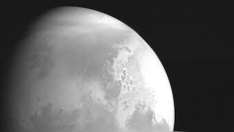 China's Tianwen-1 Mars probe returns first photos showing canyons on the Red Planet surface