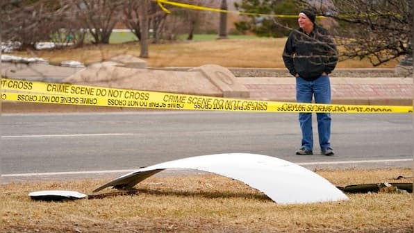 Debris falls from plane during emergency landing near Denver; no reports of injuries, say authorities
