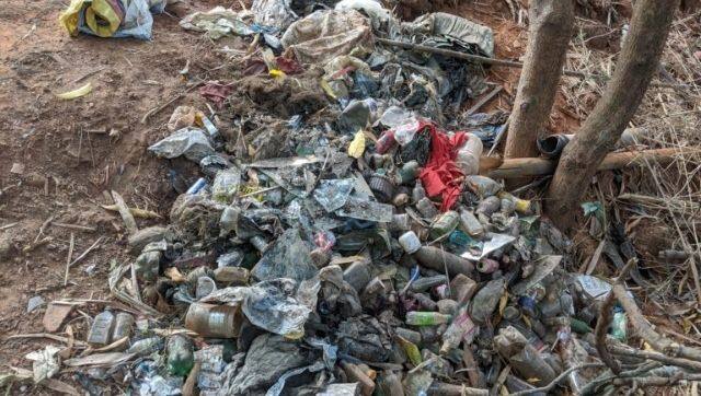 Waste that emerged from the pond after cleanup. Image via Mongabay-India/Sharada Kerkar.