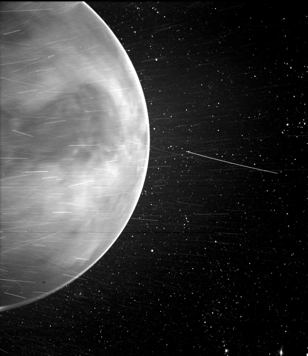 When flying past Venus in July 2020, Parker Solar Probe’s WISPR camera, detected a bright rim around the edge of the planet that may be nightglow. Bright streaks like the ones seen here are typically caused by a combination of charged particles (cosmic rays), sunlight reflected by space dust, and particles of material expelled from the spacecraft’s structures after impact with those dust grains. Image: NASA