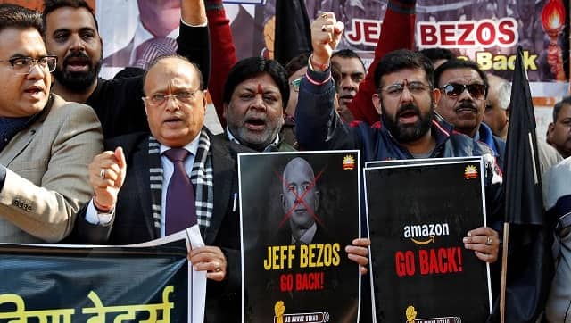 Members of the Confederation of All India Traders hold placards and shout slogans during a protest against the visit of Jeff Bezos to India in January last year. REUTERS/Adnan Abidi