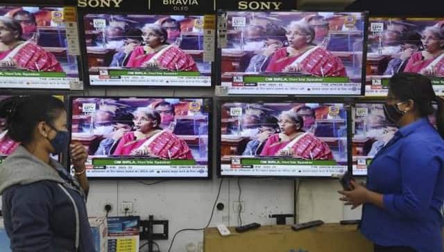 People watch Union Finance Minister Nirmala Sitharaman’s Budget speech on television. PTI