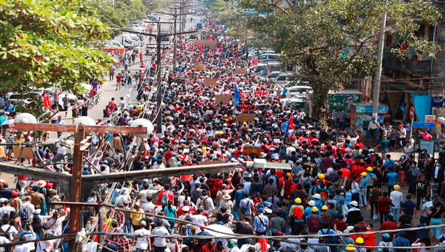 Myanmar Coup: Tens of thousands march through streets of Yangon; authorities restore internet access Myanmar Coup: Tens of thousands march through streets of Yangon; authorities restore internet access