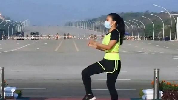 Watch: Aerobics instructor performs dance routine oblivious to Myanmar coup unfolding behind her