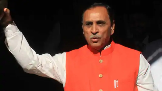 Vijay Rupani faints on stage while addressing rally in Vadodara, admitted to Ahmedabad hospital Vijay Rupani faints on stage while addressing rally in Vadodara, admitted to Ahmedabad hospital