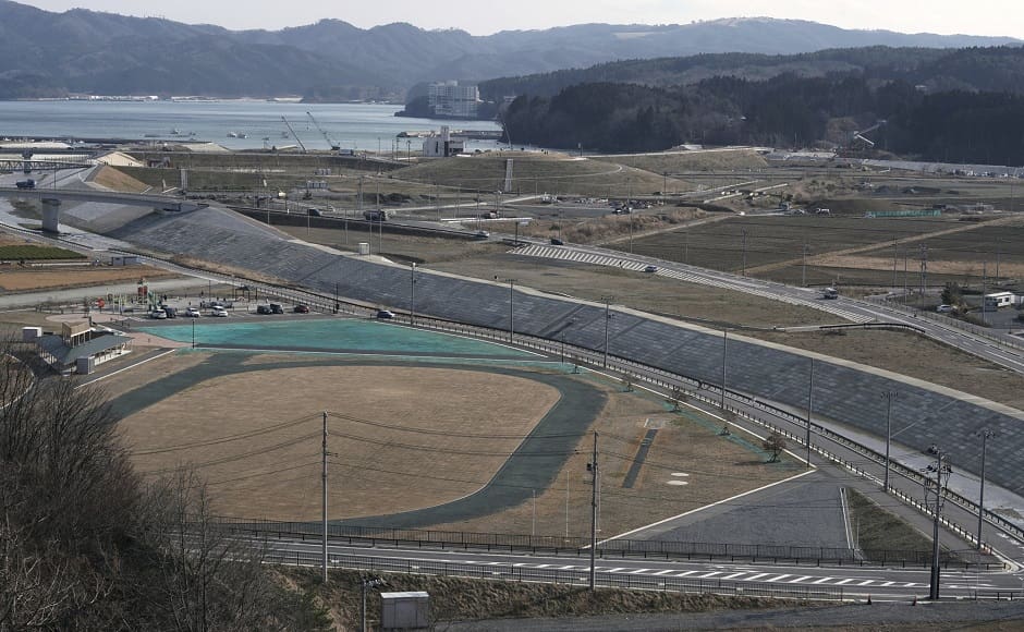 The city of Minamisanriku photographed nearly 10 years after the 2011 tsunami. Image via The Associated Press/Eugene Hoshiko The city of Minamisanriku photographed nearly 10 years after the 2011 tsunami. Image via The Associated Press/Eugene Hoshiko