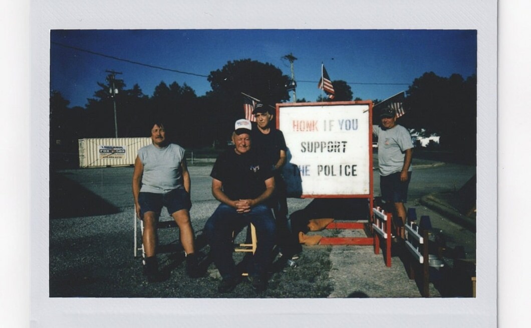 Trump supporters Roger Plott, 65; Bill Stevens, 76; Rick Warren, 65, and Jim Rainbolt 57, stand outside The Gunsmoke Club. Their clubhouse is an old gas station which later turned into a convenience store and is now a gathering place for a dozen or so friends. Image via AP/Wong Maye-E