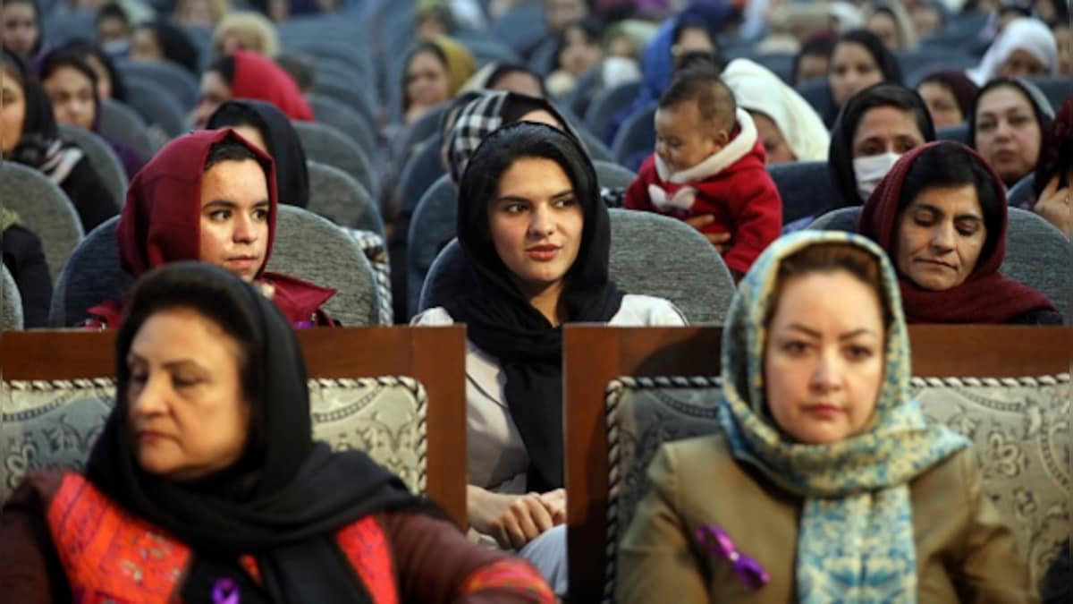 Taliban says Afghan women will be allowed to study at university under new regime, but bans co-ed classes