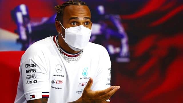 Mercedes driver Lewis Hamilton of Britain attends the Formula One Bahrain Grand Prix press conference in Sakhir, Bahrain. AP