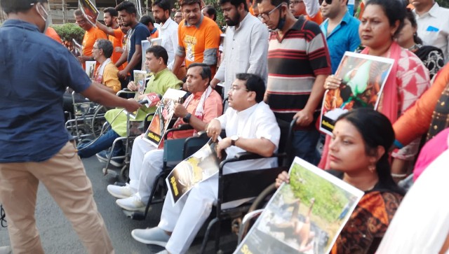 BJP protests against death of party members in Bengal, mocks Mamata Banerjee with wheelchair rally BJP protests against death of party members in Bengal, mocks Mamata Banerjee with wheelchair rally
