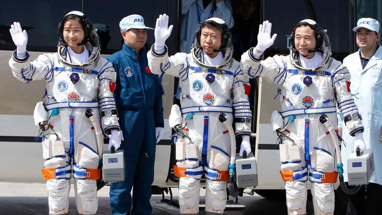 Chinese astronauts conduct spacewalk to complete work on space station's robotic arm Chinese astronauts conduct spacewalk to complete work on space station's robotic arm