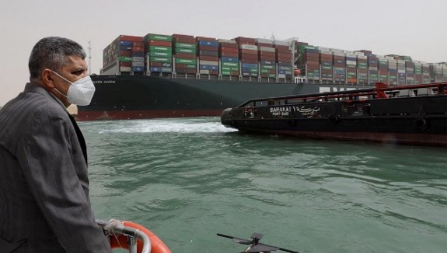 Massive container ship blocks traffic in Suez Canal; efforts to dislodge vessel underway Massive container ship blocks traffic in Suez Canal; efforts to dislodge vessel underway