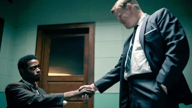 William O’Neal (L) is recruited by Roy Mitchell (Jesse Plemons)