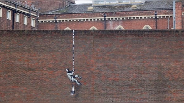Banksy confirms Reading prison artwork as his; throws weight behind campaign to turn site into arts centre