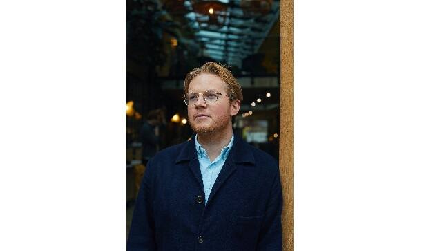 Jake Warren, a 30-year-old former journalist who founded the podcast company Message Heard more than three years ago, at his offices in London, March 10, 2021. Audio production companies in Britain “have basically lived feast to famine predicated on how many BBC commissioning rounds they win,” Warren said. (Suzie Howell/The New York Times) 