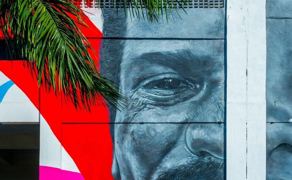 COVID-19 has demonstrated that, during a pandemic, no one is safe until everyone is safe. Leaving people behind is not an option if we are to succeed. With this ideology in mind, this mural reflects the theme of this year’s World AIDS Day, as declared by UNAIDS: “Global solidarity, shared responsibility”. Portraying several diverse yet familiar faces, the artwork celebrates these unique identities while reinforcing the notion that there are no physical determinants to AIDS.| Photograph by Pranav Gohil. COVID-19 has demonstrated that, during a pandemic, no one is safe until everyone is safe. Leaving people behind is not an option if we are to succeed. With this ideology in mind, this mural reflects the theme of this year’s World AIDS Day, as declared by UNAIDS: “Global solidarity, shared responsibility”. Portraying several diverse yet familiar faces, the artwork celebrates these unique identities while reinforcing the notion that there are no physical determinants to AIDS.| Photograph by Pranav Gohil.