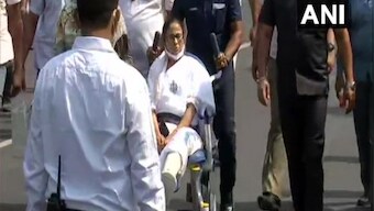 Mamata Banerjee leads roadshow in Kolkata on wheelchair four days after sustaining injury