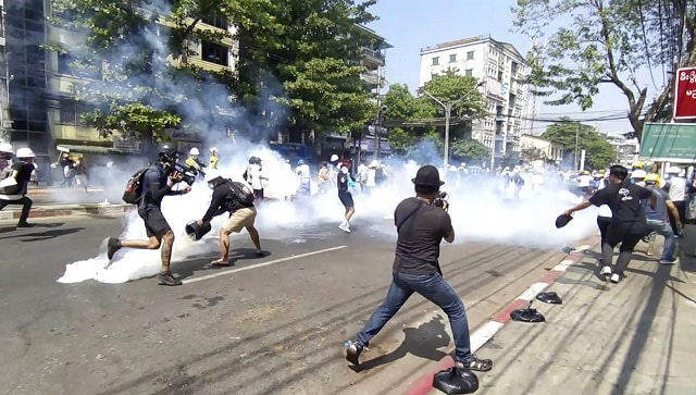 Crowds descend on Yangon streets to protest Myanmar coup, day after at least 18 died in clashes with police Crowds descend on Yangon streets to protest Myanmar coup, day after at least 18 died in clashes with police