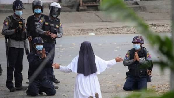 'Kill me instead': Image of Myanmar nun pleading with military to spare children goes viral
