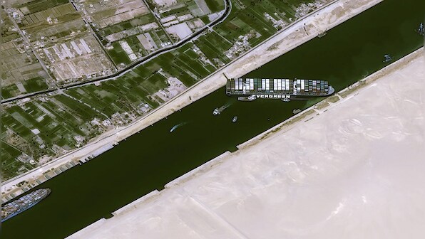 Ship stuck in Suez Canal ‘partially refloated’; efforts on to dislodge bow, claims report