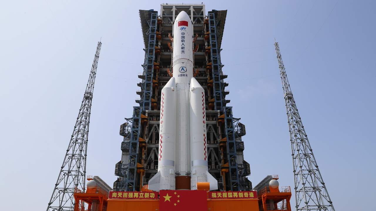 In this photo released by Xinhua News Agency, the core module of China's space station, Tianhe, on the the Long March-5B Y2 rocket is moved to the launching area of the Wenchang Spacecraft Launch Site in southern China's Hainan Province on April 23, 2021. China plans to launch the core module for its first permanent space station this week in the latest big step forward for the country’s space exploration program.  Image credit: Guo Wenbin/Xinhua via AP