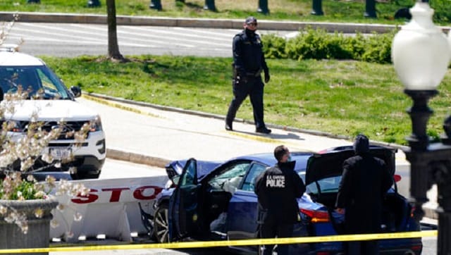 US Capitol on lockdown after car rams barricade, injuring two officers; driver shot