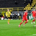 Bundesliga: Raphael Guerreiro's late goal keeps Borussia Dortmund in Champions League hunt