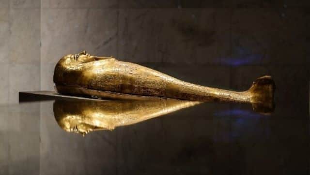 A golden sarcophagus is exhibited at Egypt's new National Museum of Egyptian Civilisation (NMEC), in the Fustat district of Old Cairo, during its official reopening a day after the Pharaohs' Golden Parade ceremony. The NMEC which opened its doors to limited exhibits from 2017, opens fully a day after the 
