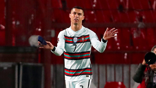 Captain’s armband thrown away by Cristiano Ronaldo fetches €64,000 at charity auction Captain’s armband thrown away by Cristiano Ronaldo fetches €64,000 at charity auction