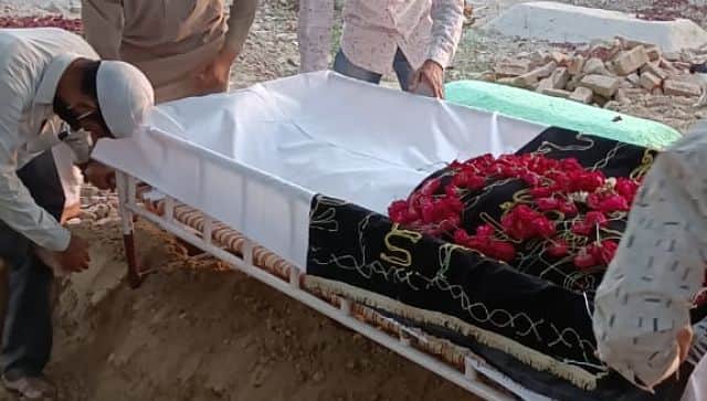 A body being prepared for burial. Firstpost/Mohammad Sartaj Alam