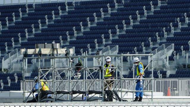 “ HOLD FOR TOKYO 2020 OLYMPIC PHOTO GALLERY ” Workers prepare the venue at Kasai Canoe Slalom Center of Tokyo 2020 Olympics Thursday, April 8, 2021, in Tokyo. (AP Photo/Eugene Hoshiko)
