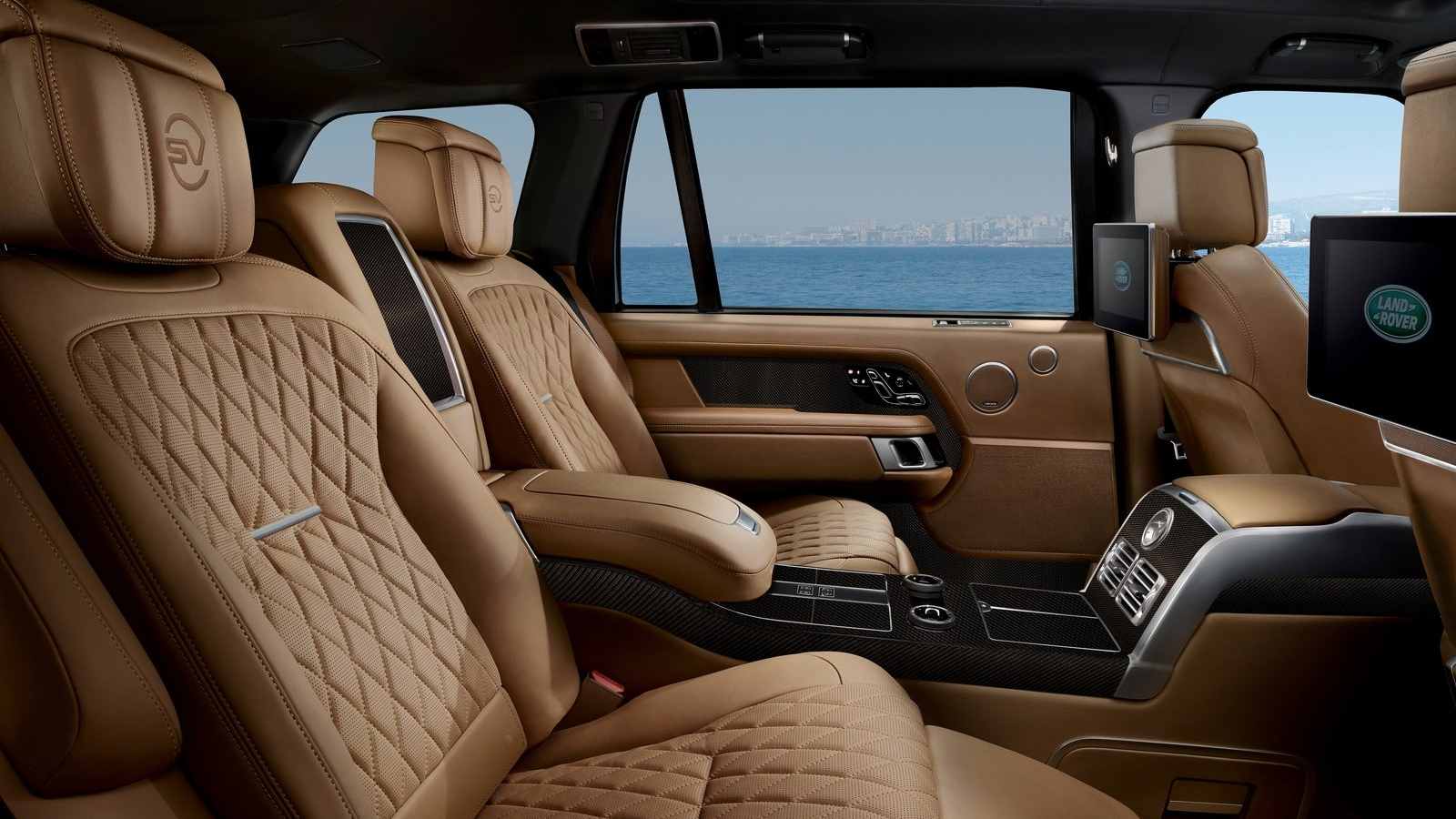 The long-wheelbase version is available with aircraft-style reclining rear seats. Image: Land Rover