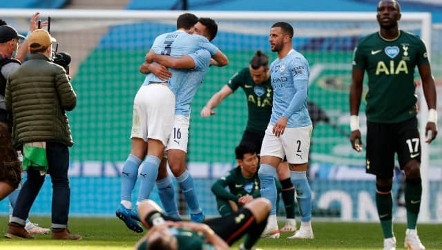 Manchester City celebrate after beating Tottenham in the EFL Cup final. AP