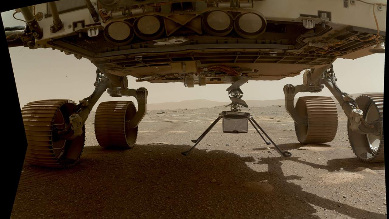NASA's Ingenuity helicopter can be seen here with all four of its legs deployed before dropping from the belly of the Perseverance rover on March 30, 2021, the 39th Martian day, or sol, of the mission. Image credit: NASA/JPL-Caltech