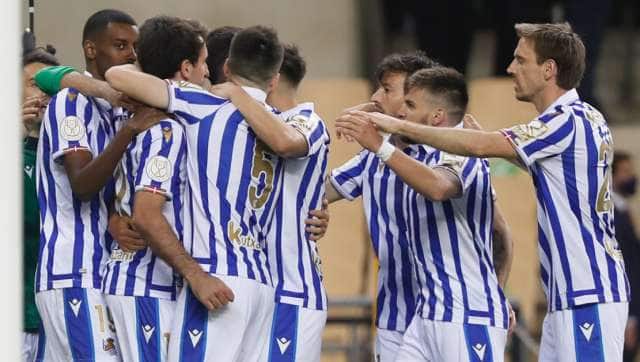 Real Sociedad players celebrate scoring their side's first goal during the final of the 2020 Copa del Rey, or King's Cup, soccer match between Athletic Bilbao and Real Sociedad at Estadio de La Cartuja in Sevilla, Spain, Saturday April 3, 2021. The game is the rescheduled final of the 2019-2020 competition which was originally postponed due to the coronavirus pandemic. (AP Photo/Angel Fernandez)