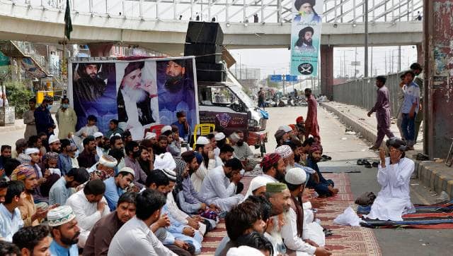 Supporters of Tehreek-e-Labbaik Pakistan during a sit-in protest against the arrest of their party leader Saad Hussain Rizvi. AP
